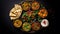 Assorted indian food on black background