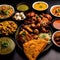 Assorted indian food on black background