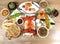 Assorted indian food on wooden background. Tandoori chicken,paneer butter masala, chicken biryani,paneer tikka, chicken tikka and