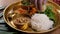 Assorted indian sri-lanka food set on wooden background. Dishes and appetisers of indeed cuisine, rice, lentils, paneer