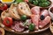 Assorted Italian antipasti - deli meats, olives and bread