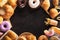 Assorted junk food multiple type on black wooden table of top view with copy space