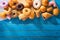 Assorted junk food multiple type on blue wooden table of top view with copy space