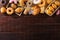 Assorted junk food multiple type on wooden table of top view with copy space