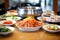 assorted kimchi appetizers on a spinning table at a korean bbq