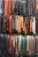 Assorted leather belts for sale in a shop