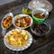 Assorted Malay dishes served on the table. Staple menu for lunch and dinner in Malaysia