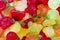 Assorted many colored colorful marmalade gummy candies,Jelly bears.laid out on flat surface.dessert for holiday,sweet gifts for