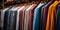 Assorted Mens Business Suits on Hangers in a Fashion Store Retail Clothing Display of Office Wear Tailored Suits in Different