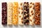 Assorted nut bars on white background. Top view of various healthy granola bars. Set of energy, sport, breakfast and
