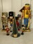 Assorted Nutcrackers, around frosted Christmas tree
