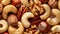 Assorted nuts arranged in a top view creating a natural background with various kinds of nuts