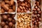 Assorted nuts in a wooden box nuts: pecan, almond, macadamia, brazil, cashew