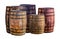 Assorted oak barrels of different sizes and colors traditionally used to store wine