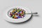 Assorted pharmaceutical medicine pills and tablets spoon. 3D rendering illustration