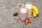 Assorted protein cocktails. Strawberry, banana and chocolate protein shakes. Sports nutrition and healthy lifestyle concept.