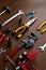 Assorted red tool set, screwdriver, pliers, saw
