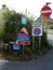 Assorted road signs in a row