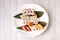 Assorted round sushi plate with maki, hosomaki, california uramaki, nigiri