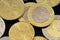 Assorted Saudi Arabian coins on a black background