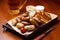 Assorted sausage and fry potatoes with sauce with beer