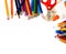 Assorted school supplies on a white background