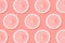 Assorted sliced fruits concept. Coral color background