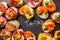 Assorted spanish tapas with fish, sausage, cheese and vegetables. Dark background, top view