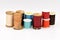 Assorted Spools of Thread on White Background