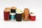 Assorted Spools of Thread on White Background