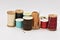 Assorted Spools of Thread on White Background