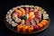 assorted sushi and maki rolls on a ceramic platter