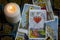 Assorted tarot cards scattered on a table, seamless pattern