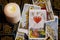 Assorted tarot cards scattered on a table, seamless pattern