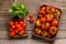 Assorted tomatoes in rustic crate