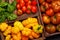 Assorted tomatoes in rustic crate