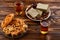 Assorted traditional eastern desserts with tea on wooden background.