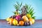 Assorted tropical fruits, orange,Ananas or pineapple, lime,mango, dragon fruit, orange, banan, rambutan and lichi on