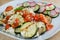 Assorted vegetables with cheese oven grilled