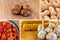 Assorted vegetables and fruits, pumpkin, strawberries, garlic on a background of corn and chestnut