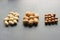 Assorted Walnuts, macadamia nuts and pecans close-up on wooden table