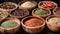 Assorted Wooden Bowls Filled With Flavorful Spices and Herbs