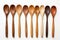 Assorted Wooden Kitchen Spoons on White Background. Generative Ai