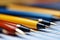 Assorted Writing Tools. Pens, Pencils, Rollerball Pens, and Markers Displayed Neatly on Table