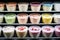 assorted yogurt cups in a supermarket fridge