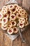 Assortement of christmas cookies vanilla kipferl, linzer cookie close-up. Vertical top view