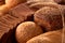 Assortement of Freshly baked traditional bread with ears of wheat