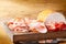 Assorti of sliced jamon, salami, ham  on wooden background