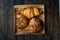 Assortment of Assorted Croissant Varieties om Wooden Plate / Variety of Bakery Pastries