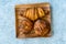 Assortment of Assorted Croissant Varieties om Wooden Plate / Variety of Bakery Pastries